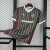 Camisa masculina Tricolor Carioca 26/27 com listras verticais vermelhas, verdes e detalhes em branco, logo do Fluminense e patrocinador Superbet