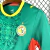 Camisa oficial Senegal II Copa de 2026 masculina da Puma na cor verde com detalhes amarelos e vermelho