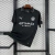 Camisa masculina preta do Manchester City II 25/26, vista traseira, com logo Puma nos ombros
