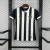 Camisa Atlético Mineiro I 26/27 - Torcedor Feminina - Preta e branca com listras douradas na internet