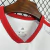 Camisa branca oficial da seleção dos Emirados Árabes Unidos 26/27 masculina Adidas com detalhes vermelhos e escudo UAE FA
