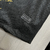 camisa-sporting-lisboa-torcedor-masculina-III-24-25-preta-com-detalhes-em-dourado-gyökeres