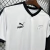 Camisa masculina branca da Nova Zelândia para a Copa de 2026, com detalhes em preto, logo Puma e símbolo da folha de samambaia
