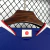 Camisa azul da seleção do Japão para a Copa de 2026, masculina, modelo torcedor da Adidas com logo da JFA no centro e detalhes em branco