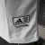 Camisa da Seleção da Alemanha para a Copa 2026, modelo jogador Adidas masculina na cor branca com design em preto, vermelho e amarelo