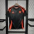 camisa-colombia-ii-away-24-25-torcedor-masculina-preta-com-detalhes-em-laranja