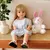 Boneca Bebê Reborn De Silicone Princesa Loira 55cm Com Coelho de Pelúcia na internet