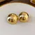 BRINCO ESFERA | PRATA COM OURO AMARELO 18K na internet