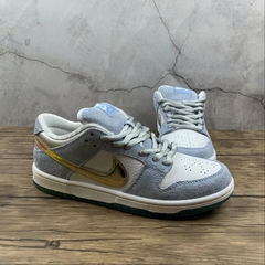 Sean Cliver x Nike SB Dunk Low Holiday Special - Stock Sneakers