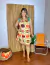 Vestido Curto com Amarração no Pescoço Estampa Raízes do Sol na internet