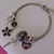 Pulseira com Pingentes Estilo Berloque – Acessório Fashion - Lu Lu Cosméticos 