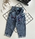 Calça Jeans Mom Stitch