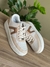 Tênis Ollie Rose Gold na internet