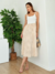 Vestido Canelado em cima off white e Listrado preto e branco em baixo na Saia - Tamanho M
