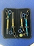 Kit 4 Tesouras 8-5 aco 440c (Reta- Curva- Tubarao- Semi Dentada) Estojo - comprar online