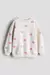 Buzo H&M corazones con frisa