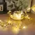 Luzes de fio de cobre , folhas minúsculas douradas, luz de fadas, na internet