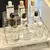 Acrílico de três camadas transparente perfume organizador rack q frasco mini c - comprar online