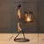 Castiçal de personagem abstrato de metal nórdico, castiçal, escultura, estatu na internet