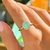 ANEL OVAL FUSION ESMERALDA COLOMBIANA CRAVEJADO EM GARRAS - comprar online