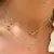 COLAR LONGO COM 12 GOTAS DE CRISTAIS RODOLITA, PERIDOTO E AMETISTA