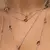 COLAR LONGO COM 12 GOTAS DE CRISTAIS RODOLITA, PERIDOTO E AMETISTA na internet