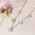 COLAR CORAÇÕES DE MADREPÉROLA COM ZIRCÔNIAS BRANCAS 50CM - comprar online