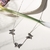 COLAR 3 BORBOLETAS COM ZIRCÔNIAS RUBI E ZIRCÔNIAS BRANCAS 45CM - loja online