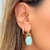 BRINCO EARBLING OVAL DE FUSION TURMALINA LIGHT E ZIRCÔNIAS BRANCAS