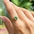 ANEL OVAL DE CRISTAL ESMERALDA E ZIRCÔNIAS BRANCAS - comprar online