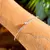 BRACELETE MINI CORAÇÃO CRAVEJADO DE ZIRCÔNIAS BRANCAS