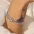 BRACELETE MINI CORAÇÃO CRAVEJADO DE ZIRCÔNIAS BRANCAS - comprar online