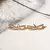 BRINCO EARHOOK CRUZADO COM ZIRCÔNIAS BRANCAS - comprar online