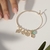 BRACELETE GOTA DE FUSION TURMALINA LIGHT, FIGA, SÃO BENTO, NOSSA SENHORA DE FÁTIMA E TREVO - comprar online