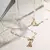 PULSEIRA NOSSA SENHORA APARECIDA COM PÉROLAS COREANAS E ZIRCÔNIAS BRANCAS 20CM - Mar Doce Semijoias