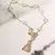 PULSEIRA NOSSA SENHORA APARECIDA COM PÉROLAS COREANAS E ZIRCÔNIAS BRANCAS 20CM - loja online