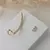 Brinco ear cuff com pedra de zircônia