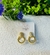 Brinco Base Cravejada com Circulo Torcido Pendurado no Dourado