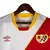 Camisa Rayo Vallecano I 23/24 - Torcedor Umbro Masculina - Branca com detalhes em vermelho e amarelo - GM Shirt | ARTIGOS ESPORTIVOS