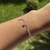 Pulseira com Pingente Estrela e Coração na internet