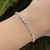 Pulseira Infinito Com Pontos de Luz - comprar online