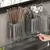 Organize sua Cozinha com Elegância: Suporte Multifuncional de Parede para Talheres! na internet
