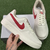 Tênis Nike Air Force Branco/Vermelho Unissex na internet