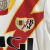 Kit Infantil Rayo Vallecano I 23/24 Umbro - Branco com detalhes em amarelo e vermelho - loja online