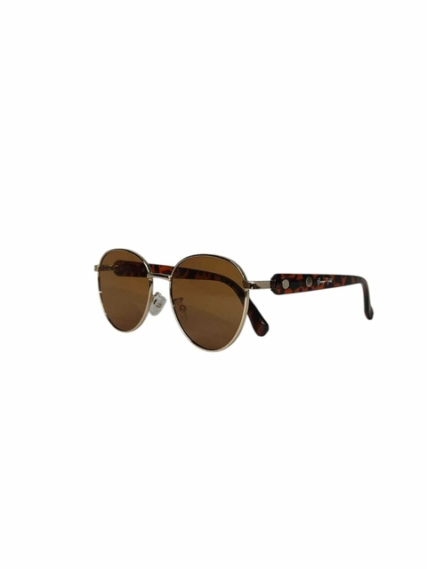 Lente na cor caramelo, armação dourada e haste em acetato estampado de oncinha.