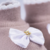 SAPATO DE BEBE LACO GORGURAO-NUDE C/ BRANCO-RN - comprar online