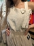 Blusa Linho Elegance com Laço Assimétrico na internet