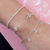 Pulseira de Prata Corações de Zircônias 18cm: Brilho e Amor