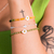 Pulseira de Prata Cristais Verdes Margarida 21cm: Brilho e Estilo - Taci Alcolea
