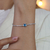 Pulseira de Prata Banhada a Ródio Riviera c/ Zircônia Azul Quadrada 18cm